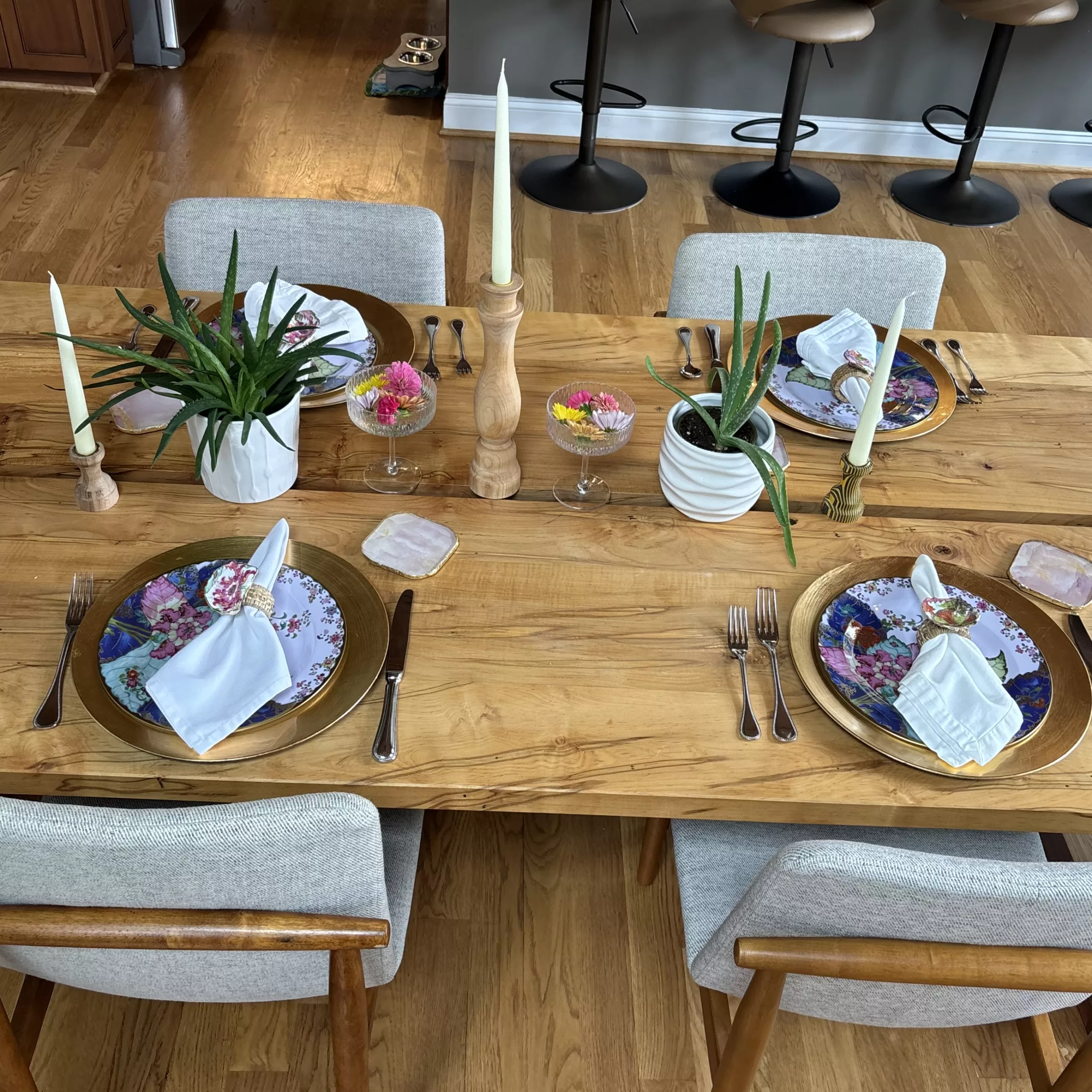 Summer table set with linen napkin rings and hand-turned candlesticks